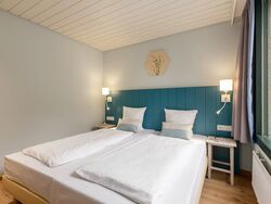 Schlafzimmer eines Bungalows der Kategorie Premium Hund