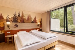 Schlafzimmer eines Waldtiere-Bungalows